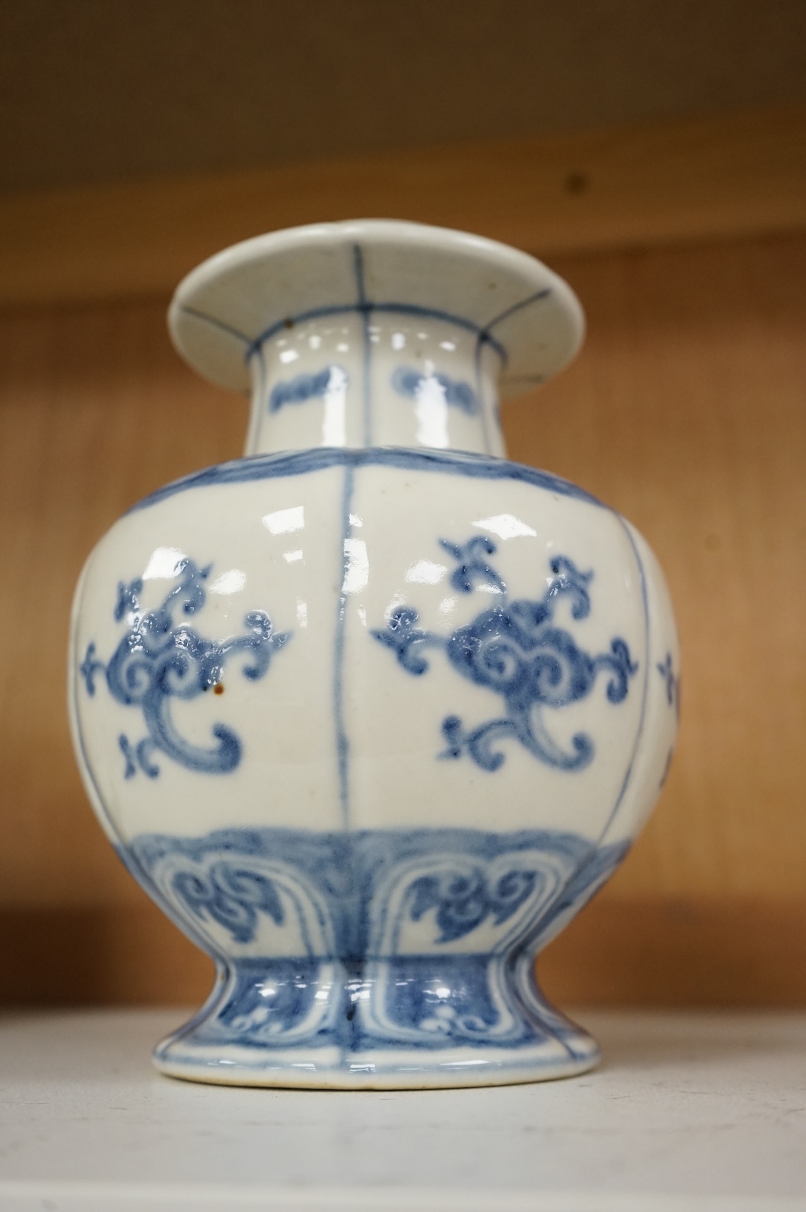 A Chinese blue and white pomegranate shaped vase, 18cm high
